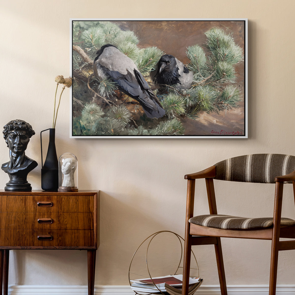 Hooded Crows (Kråkor), 1891 by Bruno Liljefors as a white floater framed canvas featuring a realistic scene of crows interacting on grassy terrain, styled above a mid-century console in a contemporary living area.