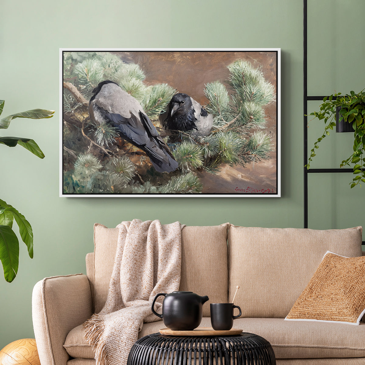 White floater framed canvas featuring a wildlife painting of dark birds against muted landscape, displayed above a sofa in a modern living room.