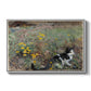 Cat on a Flowery Meadow, 1887 by Bruno Liljefors in a white floater framed canvas wall art display.