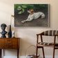 Portrait of a Dog, 1891 by Bruno Liljefors as a white floater framed canvas featuring an animal painting of dog stretched out on earthy terrain, styled above a mid-century console in a contemporary living area.