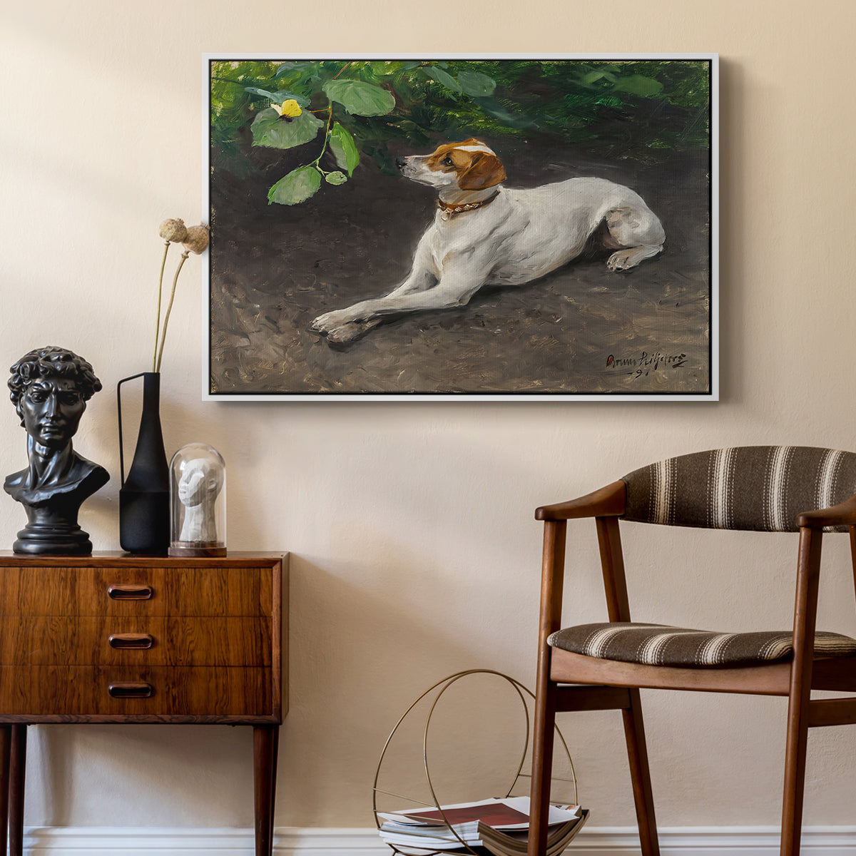 Portrait of a Dog, 1891 by Bruno Liljefors as a white floater framed canvas featuring an animal painting of dog stretched out on earthy terrain, styled above a mid-century console in a contemporary living area.