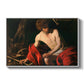 Saint John the Baptist in the Wilderness, c. 1603-1604 by Caravaggio in a white floater framed canvas wall art display.