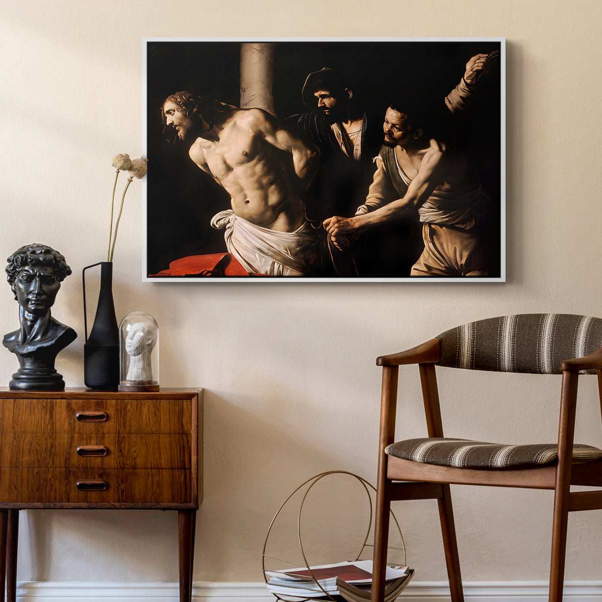 The Flagellation of Christ at the Column (Rouen Version), 1606 by Caravaggio as a white floater framed canvas featuring a biblical depiction of men whipping Christ tied to pillar, styled above a mid-century console in a contemporary living area.
