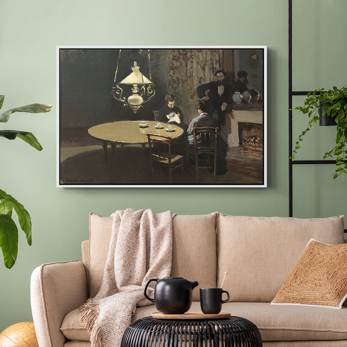 White floater framed canvas featuring an intimate indoor scene with figure and table in low lighting, displayed above a sofa in a modern living room.