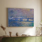 White floater framed canvas of Charing Cross Bridge, 1903 by Claude Monet, featuring an urban landscape with bridge and water rendered in blurred tones above a sideboard in a softly lit hallway.