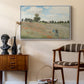 The Poppy Field near Argenteuil, 1873 by Claude Monet as a white floater framed canvas featuring a bright meadow filled with poppies under open sky, styled above a mid-century console in a contemporary living area.