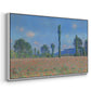 Angled view of Poppy Field (Giverny), 1890-1891 by Claude Monet in a white floater framed canvas.