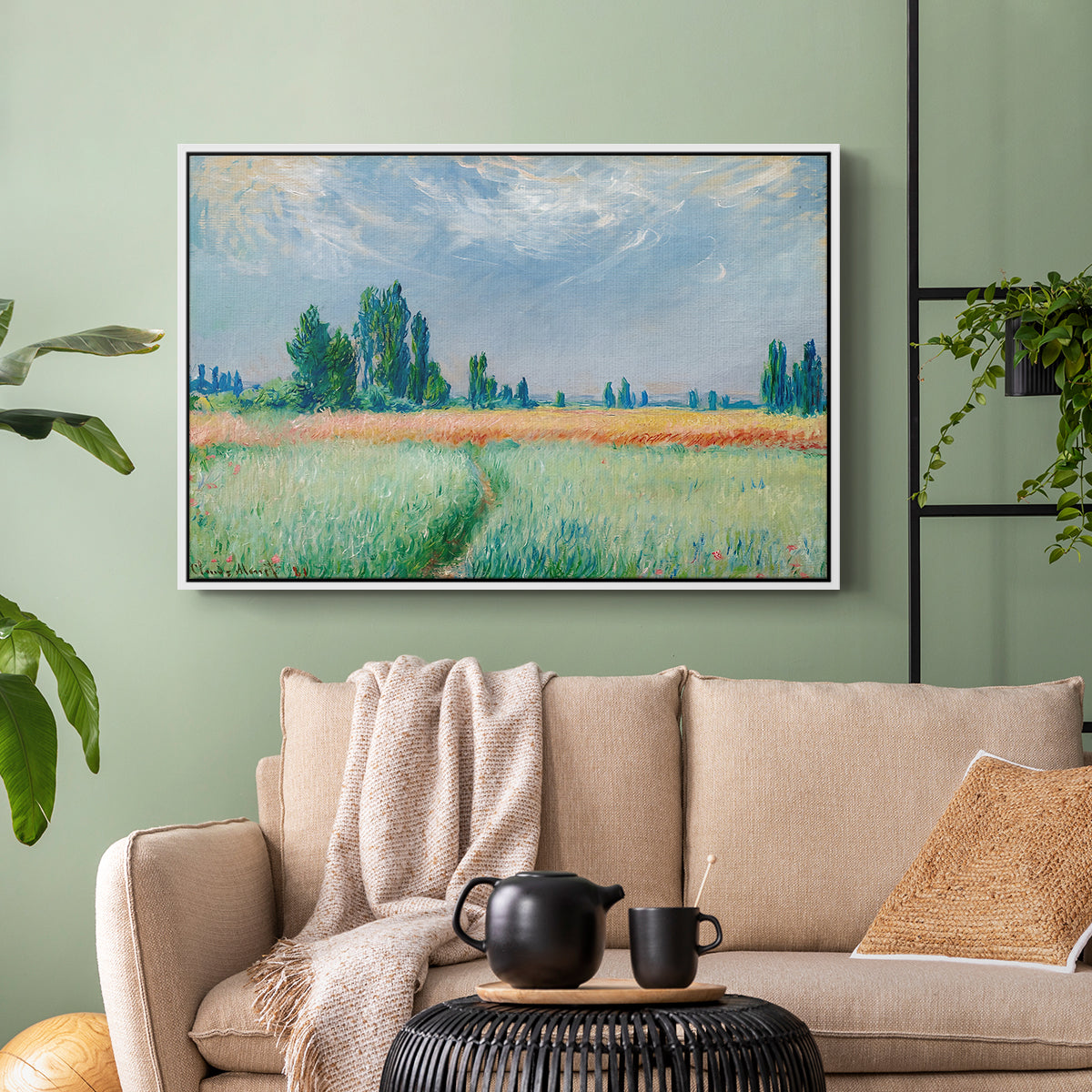 White floater framed canvas featuring a serene rural scene with textured wheat under natural light, displayed above a sofa in a modern living room.