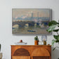 Waterloo Bridge, Gray Day, 1903 by Claude Monet in a white floater framed canvas featuring a muted cityscape of bridge spanning river under overcast sky, displayed above a wood console cabinet.