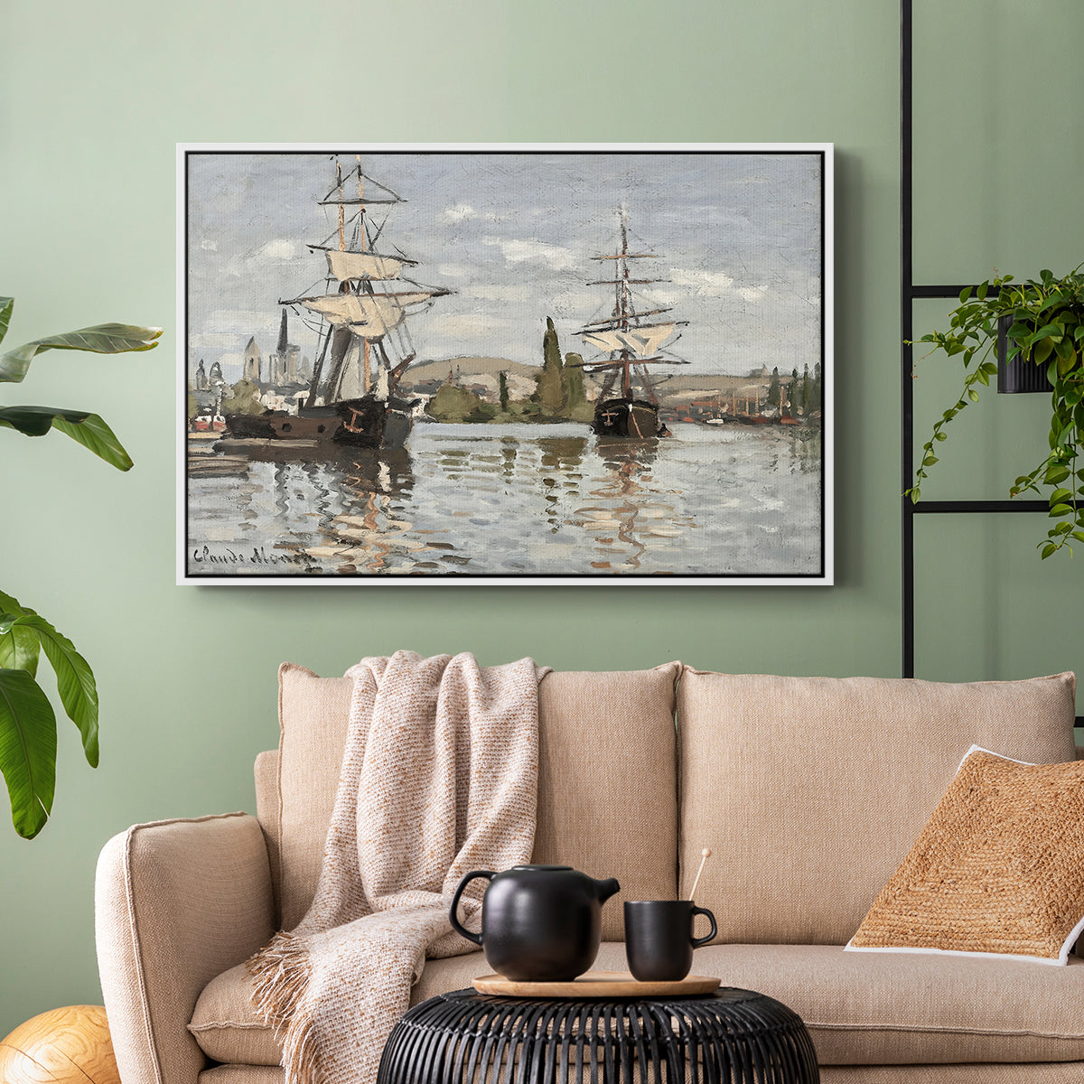 White floater framed canvas featuring a nautical landscape with vessels resting on calm water, displayed above a sofa in a modern living room.