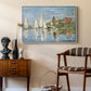Regatta at Argenteuil, 1872 by Claude Monet as a white floater framed canvas featuring an impressionist depiction of sailing competition on water, styled above a mid-century console in a contemporary living area.
