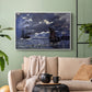 White floater framed canvas featuring an atmospheric maritime view with ships in moonlit darkness, displayed above a sofa in a modern living room.