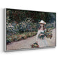 Angled view of Young Girl in the Garden at Giverny, 1888 by Claude Monet in a white floater framed canvas.