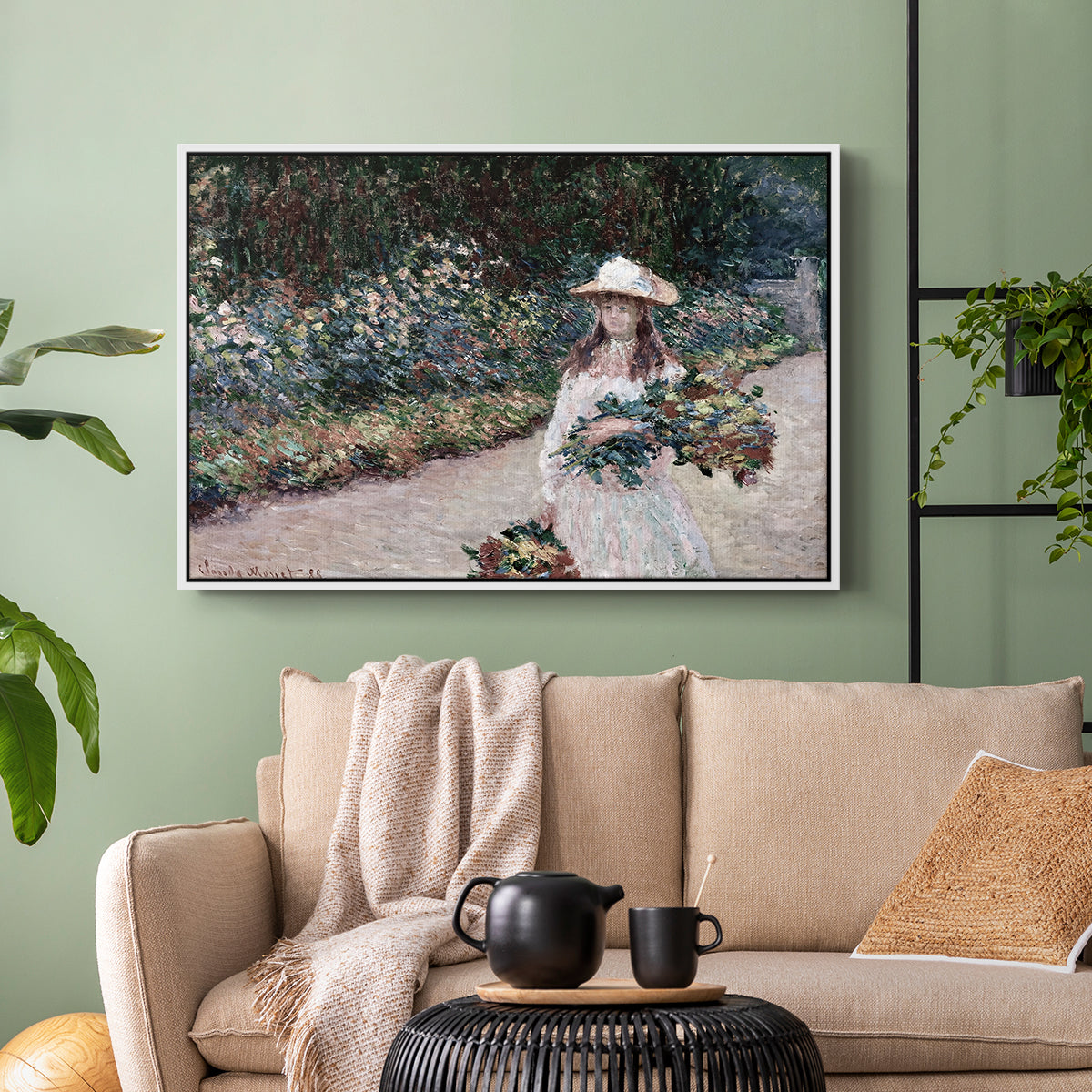 White floater framed canvas featuring a tranquil outdoor portrait of girl in floral setting, displayed above a sofa in a modern living room.