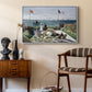 Garden at Sainte-Adresse, 1867 by Claude Monet as a white floater framed canvas featuring a vibrant garden scene with colorful blooms and distant sea, styled above a mid-century console in a contemporary living area.