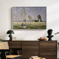 Summer (L'ete), 1874 by Claude Monet displayed in a white floater framed canvas above a dark wood credenza in an entryway.