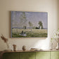 White floater framed canvas of Summer (L'ete), 1874 by Claude Monet, featuring an impressionist countryside scene with figure resting in shade above a sideboard in a softly lit hallway.
