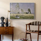 Summer (L'ete), 1874 by Claude Monet as a white floater framed canvas featuring a sunlit meadow with woman surrounded by greenery, styled above a mid-century console in a contemporary living area.