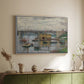 White floater framed canvas of Bridge at Argenteuil on a Gray Day, c. 1876 by Claude Monet, featuring an impressionist riverscape with overcast atmosphere and soft tones above a sideboard in a softly lit hallway.