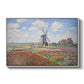 Tulip Fields with the Rijnsburg Windmill, 1886 by Claude Monet in a white floater framed canvas wall art display.