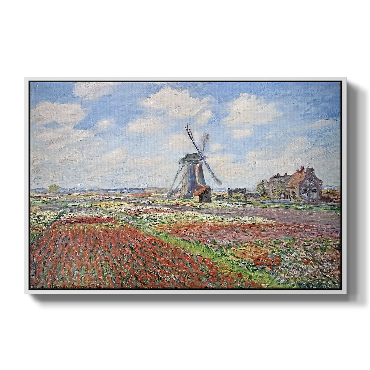 Tulip Fields with the Rijnsburg Windmill, 1886 by Claude Monet in a white floater framed canvas wall art display.