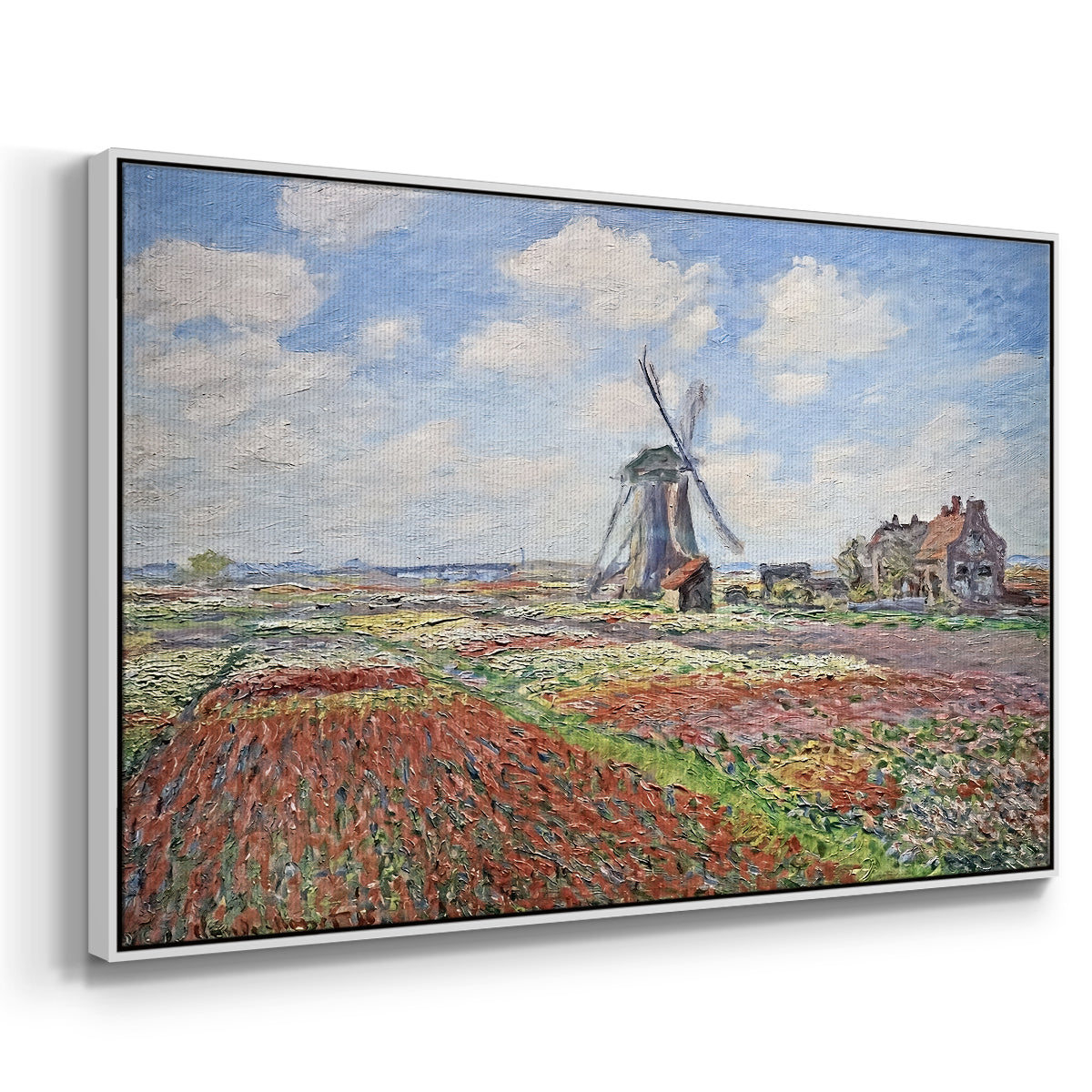 Angled view of Tulip Fields with the Rijnsburg Windmill, 1886 by Claude Monet in a white floater framed canvas.