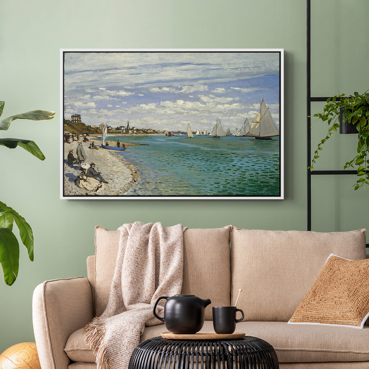 White floater framed canvas featuring a nautical scene with boats racing near seaside town, displayed above a sofa in a modern living room.