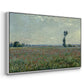 Angled view of Poppy Field, 1881 by Claude Monet in a white floater framed canvas.