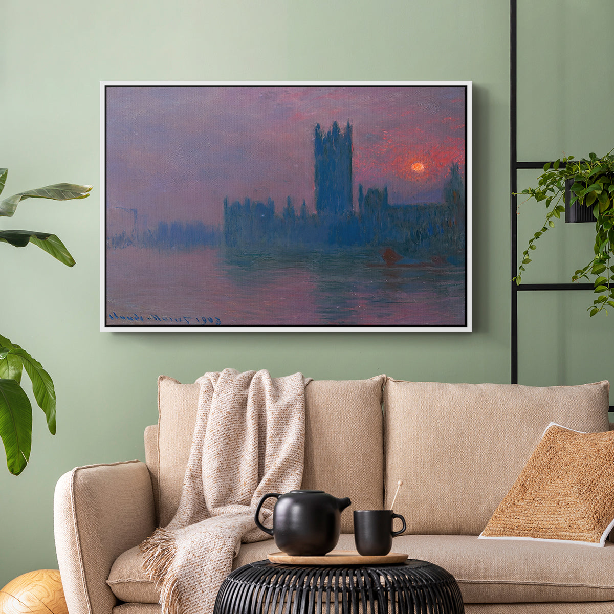 White floater framed canvas featuring a dramatic skyline with reflections under colorful sky, displayed above a sofa in a modern living room.