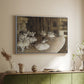 White floater framed canvas of The Rehearsal of the Ballet Onstage, 1874 by Edgar Degas, featuring a stage rehearsal scene with dancers preparing performance above a sideboard in a softly lit hallway.