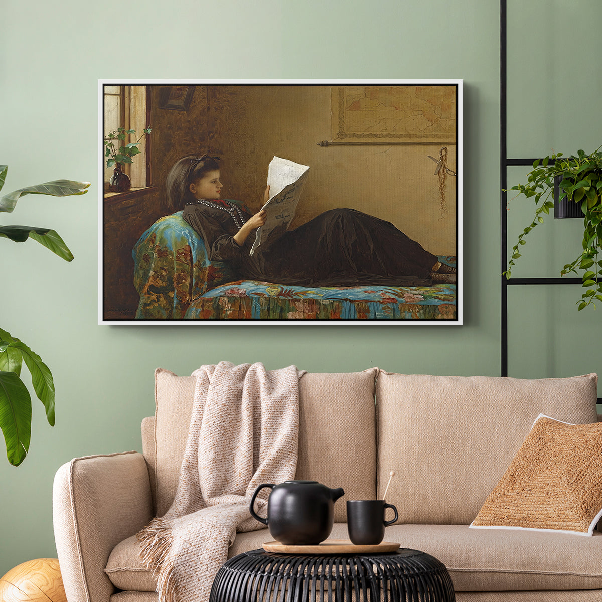 White floater framed canvas featuring a casual gathering around newspaper in rustic room, displayed above a sofa in a modern living room.