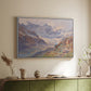 White floater framed canvas of Odenwinklkees with the Johannisberg, 1902 by Edward Theodore Compton, featuring a mountain scene with glacier stretching through rocky valley above a sideboard in a softly lit hallway.