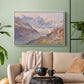 White floater framed canvas featuring an expansive alpine view with ice and distant mountains, displayed above a sofa in a modern living room.