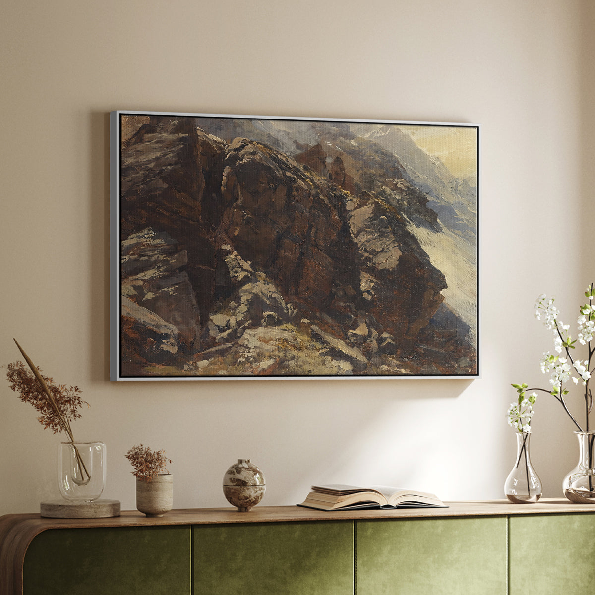 White floater framed canvas of High Mountain Study, c. 1870 by Edward Theodore Compton, featuring a detailed study of rugged mountain landscape with sharp contours above a sideboard in a softly lit hallway.
