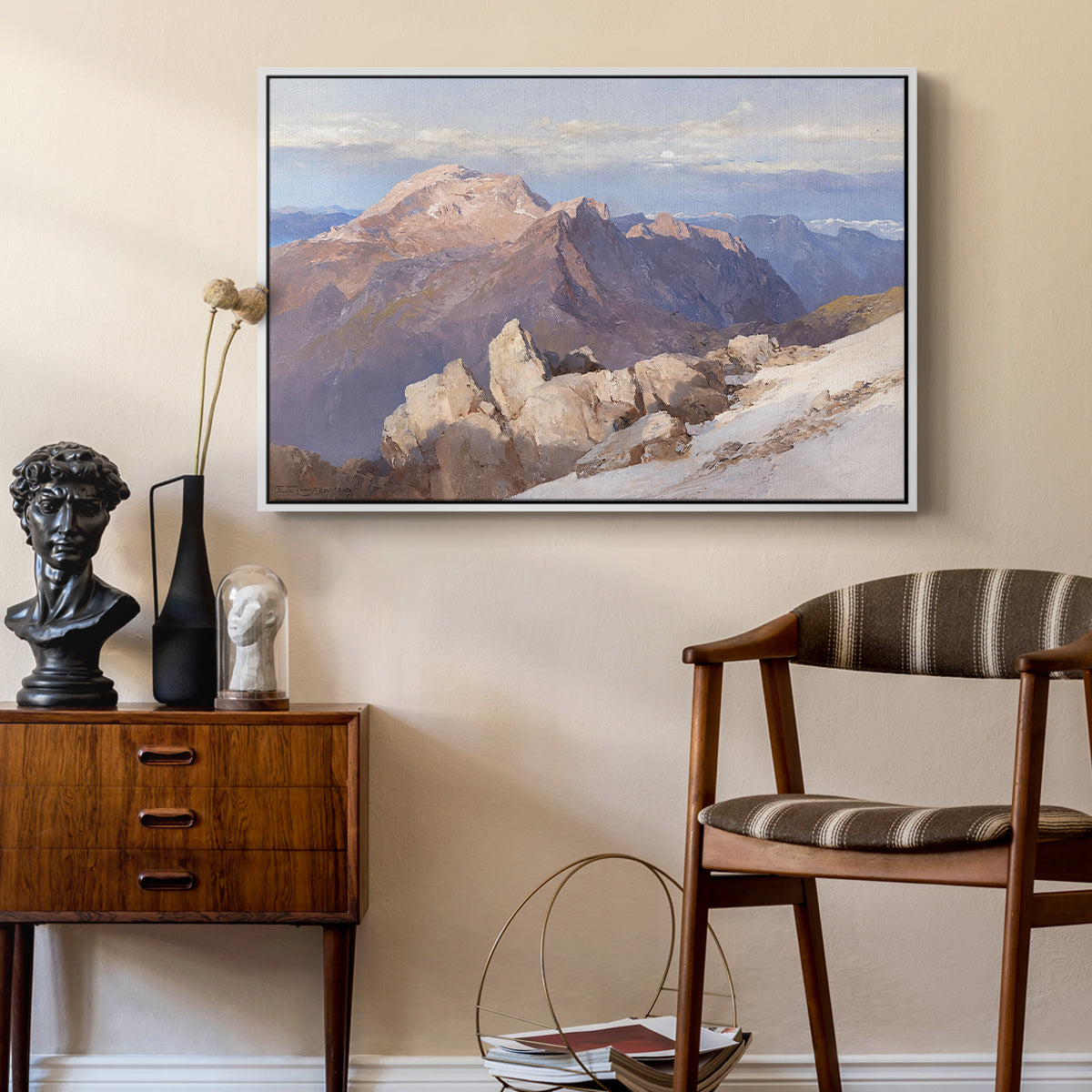 Hoher Göll from Watzmann-Hocheck, 1919 by Edward Theodore Compton as a white floater framed canvas featuring a high vantage point overlooking rugged mountain terrain, styled above a mid-century console in a contemporary living area.