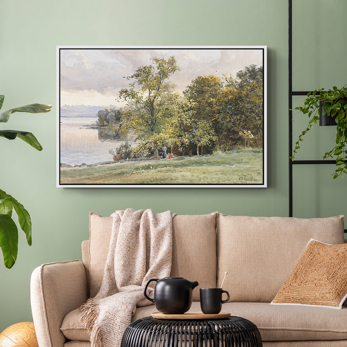 White floater framed canvas featuring a tranquil lakeside view with soft atmospheric tones, displayed above a sofa in a modern living room.