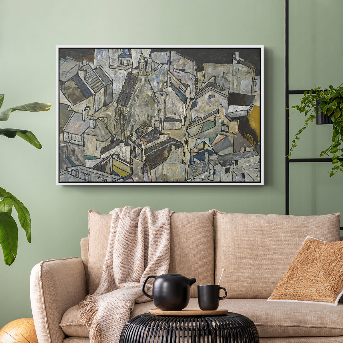 White floater framed canvas featuring a stylized urban composition with geometric structures and muted tones, displayed above a sofa in a modern living room.