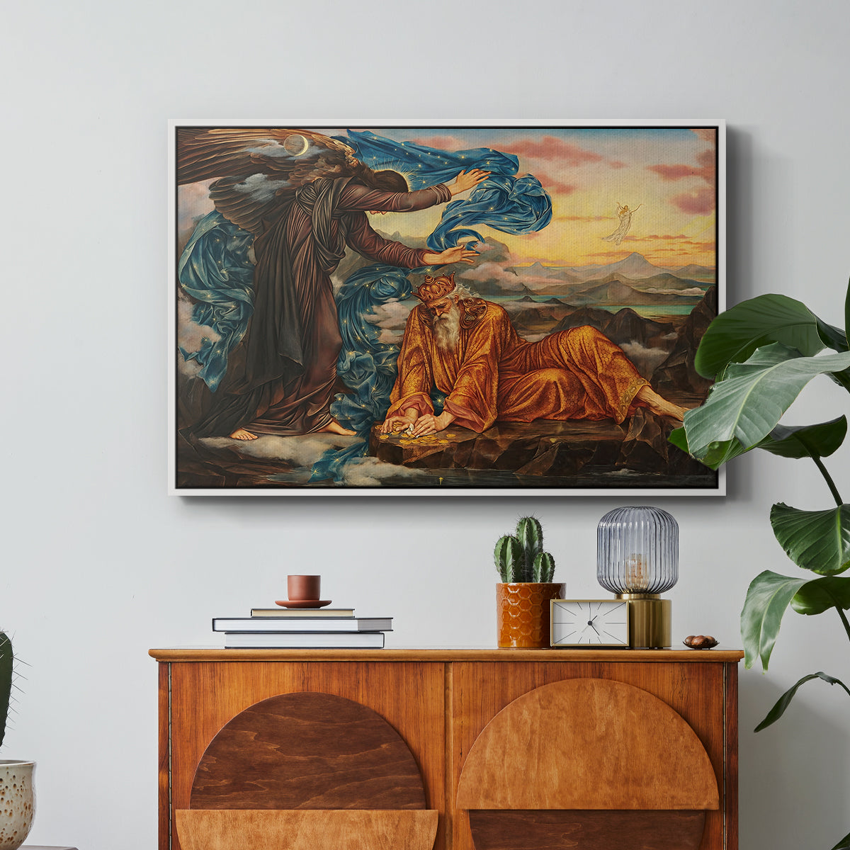 Earthbound, 1897 by Evelyn De Morgan in a white floater framed canvas featuring a reclining female figure surrounded by symbolic elements in dreamlike setting, displayed above a wood console cabinet.