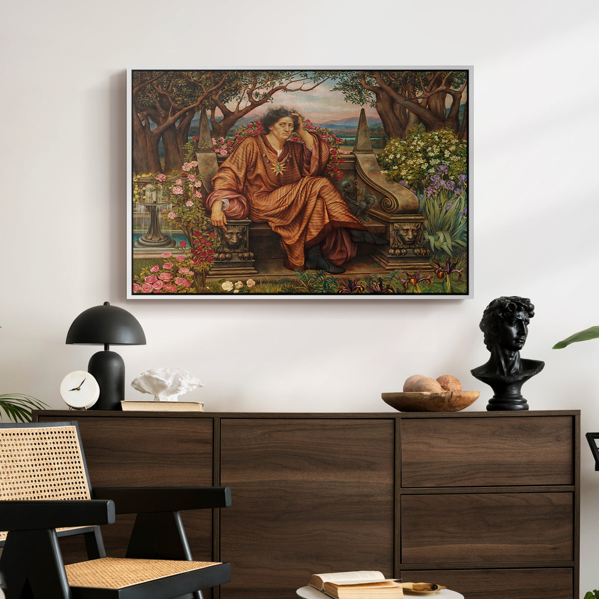 A Soul in Hell, c. 1901-1902 by Evelyn De Morgan displayed in a white floater framed canvas above a dark wood credenza in an entryway.