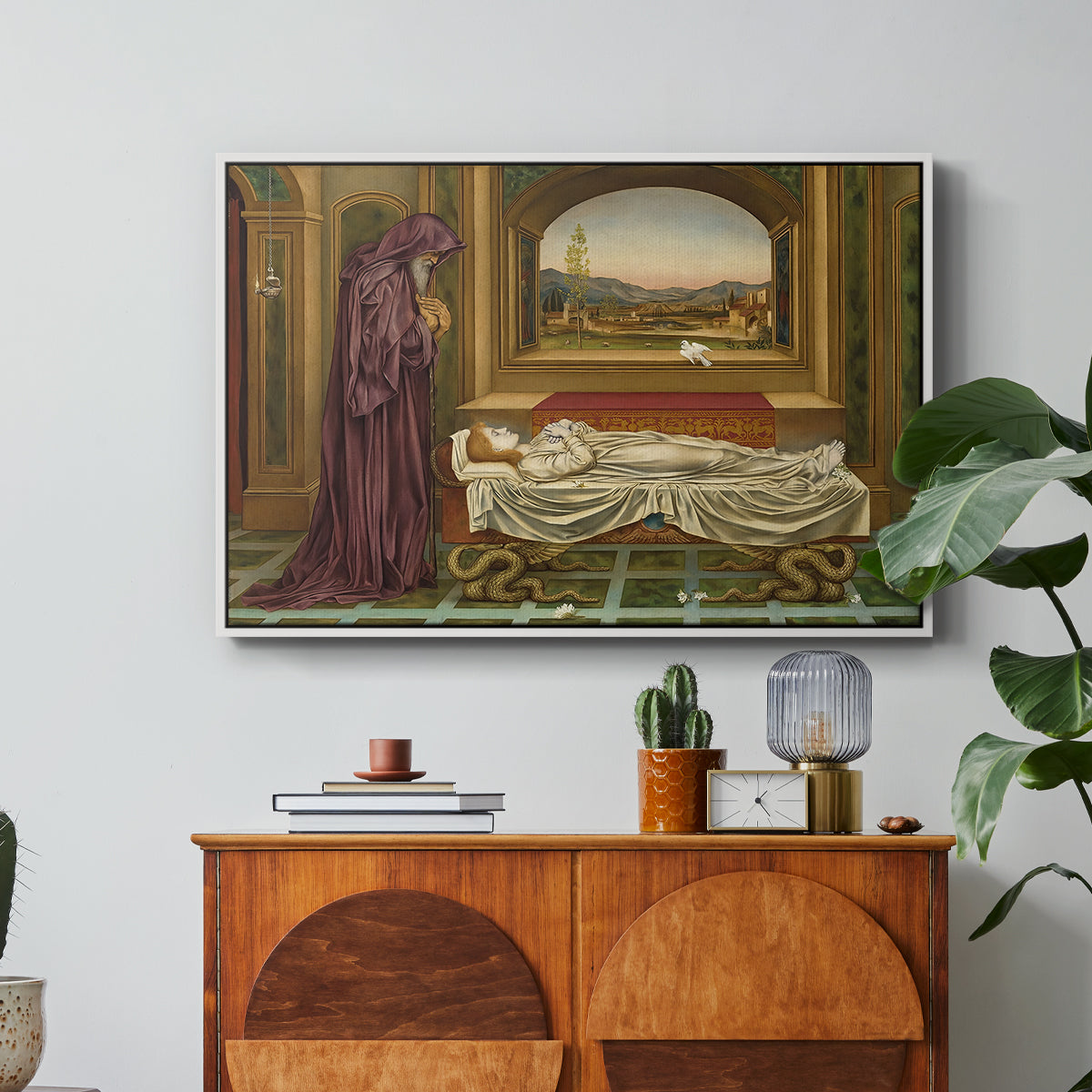 The Wandering Jew: Whom the Gods Love Die Young, 1888 by Evelyn De Morgan in a white floater framed canvas featuring a solitary figure standing in interior space with contemplative expression, displayed above a wood console cabinet.