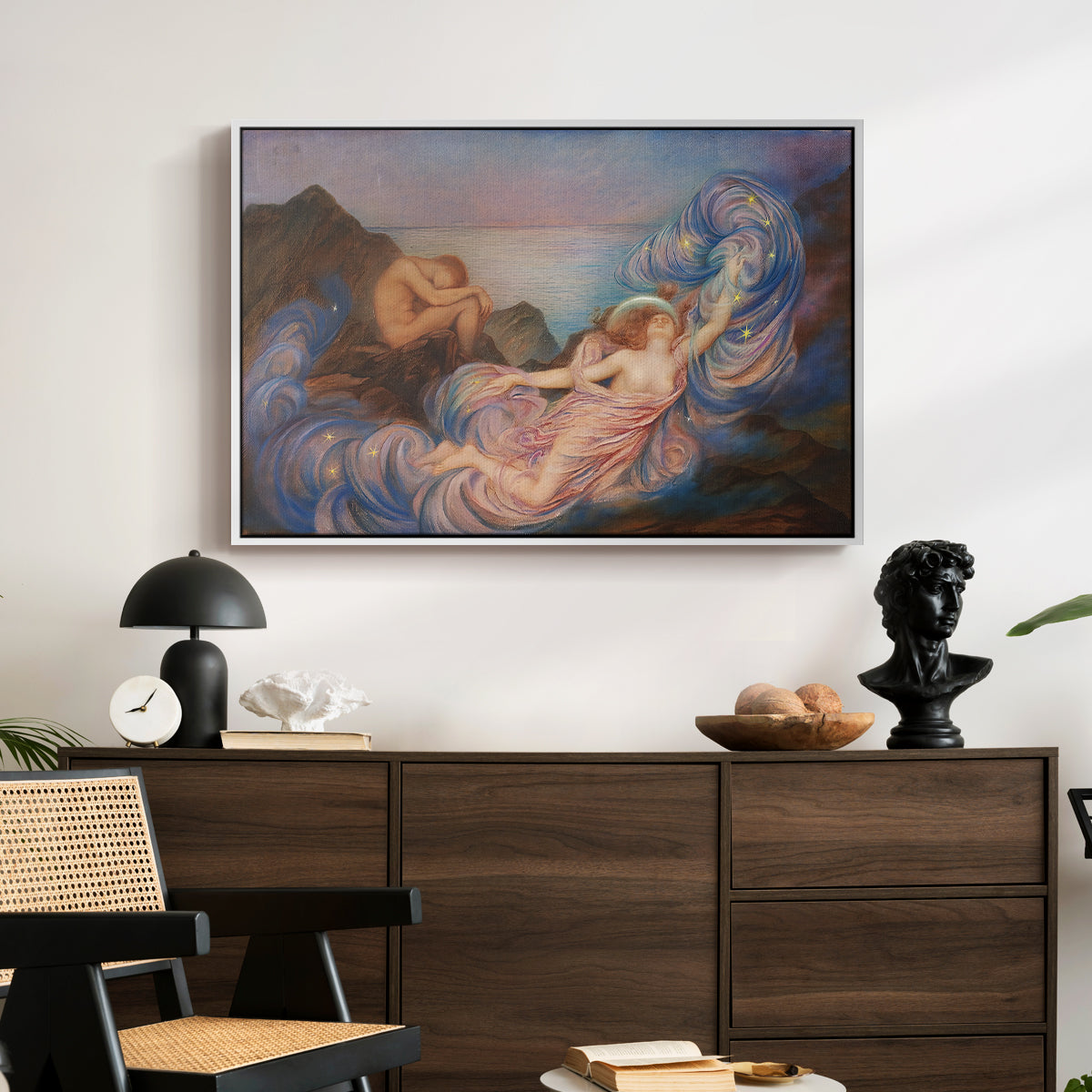 Twilight, 1914 by Evelyn De Morgan displayed in a white floater framed canvas above a dark wood credenza in an entryway.