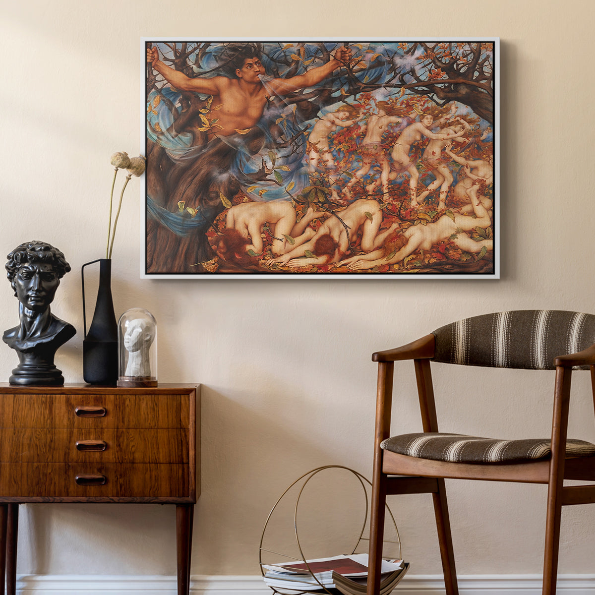 Boreas and the Fallen Leaves, c. 1910-1914 by Evelyn De Morgan as a white floater framed canvas featuring an energetic depiction of figures swept through air by wind, styled above a mid-century console in a contemporary living area.