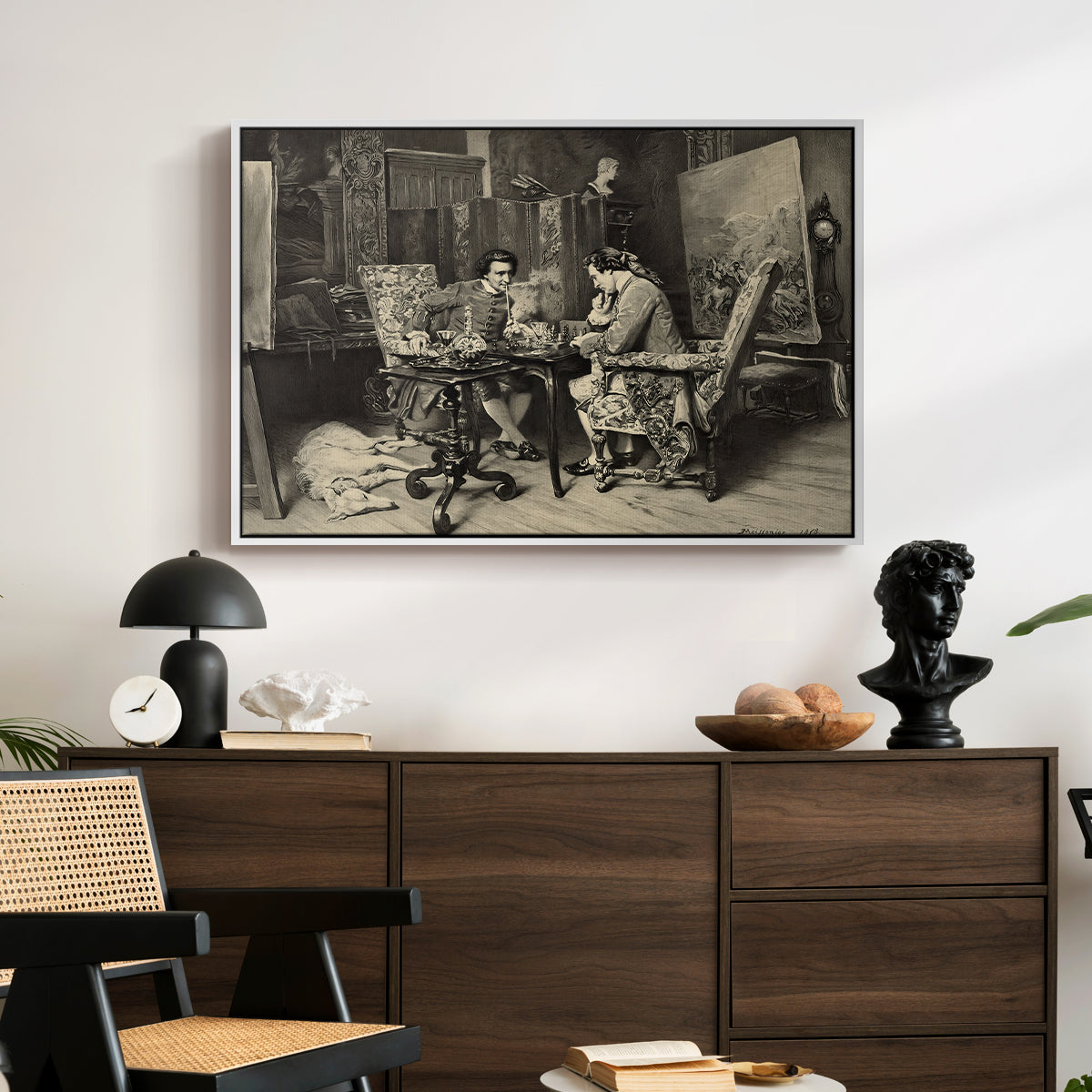 The Chess Players, 1858 by Ernest Meissonier displayed in a white floater framed canvas above a dark wood credenza in an entryway.