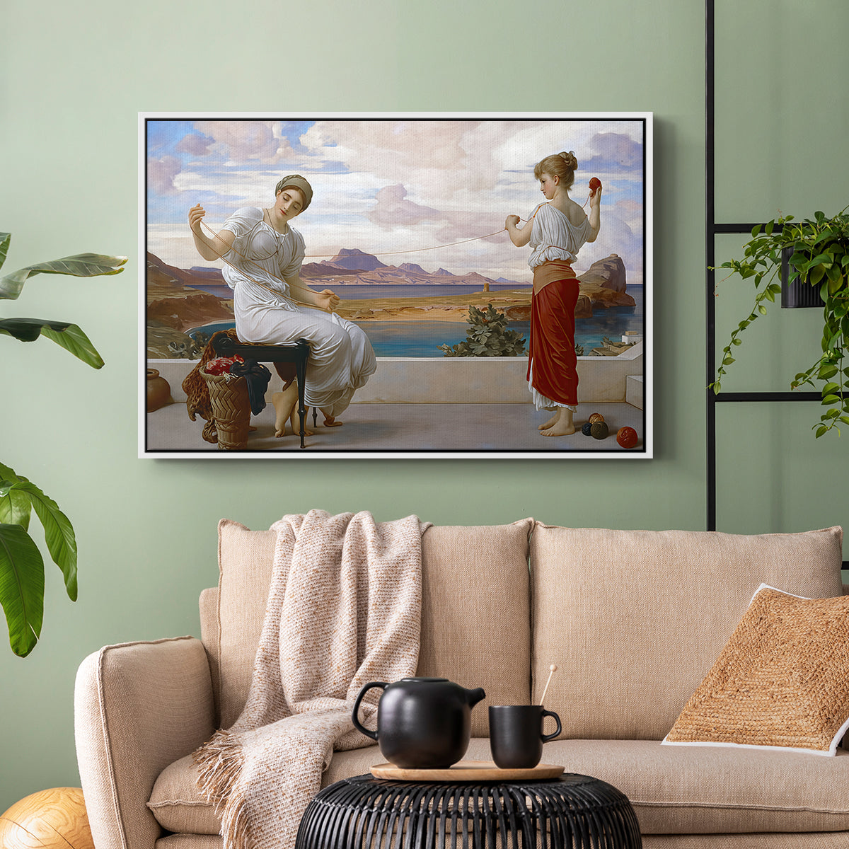 White floater framed canvas featuring an elegant composition of women performing domestic task, displayed above a sofa in a modern living room.