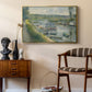 Wash-House Boat at Bas-Meudon, c. 1874 by Pierre-Auguste Renoir as a gold floater framed canvas featuring an impressionist depiction of working boat along calm waterway, styled above a mid-century console in a contemporary living area.