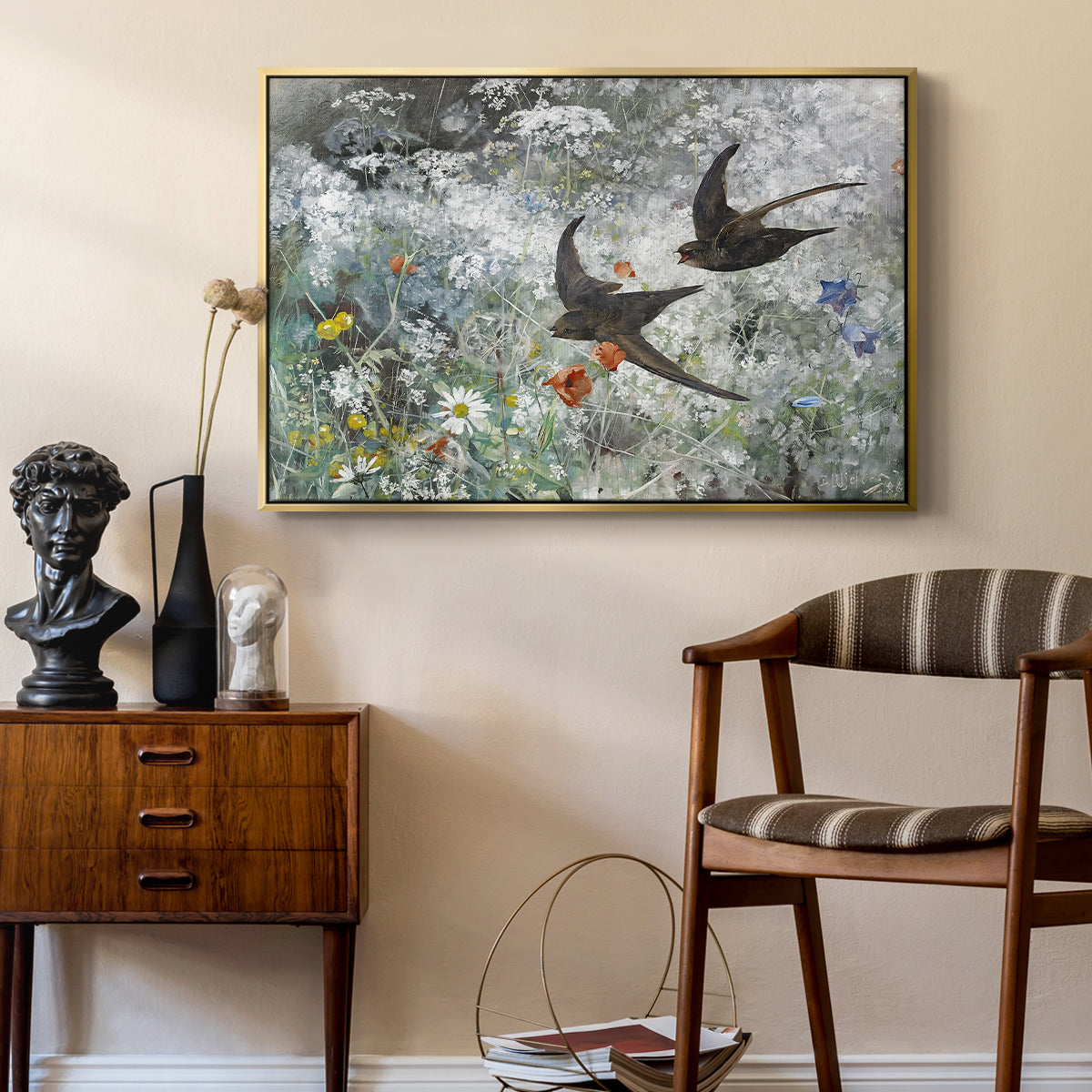 Common Swifts, 1886 by Bruno Liljefors as a gold floater framed canvas featuring a multiple birds flying together in natural outdoor scene, styled above a mid-century console in a contemporary living area.