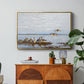 Greylag Geese (Grågäss), 1922 by Bruno Liljefors in a gold floater framed canvas featuring a group of geese gathered near water in a natural wetland landscape, displayed above a wood console cabinet.
