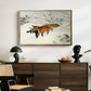 Fox in Snow Landscape, 1900 by Bruno Liljefors displayed in a gold floater framed canvas above a dark wood credenza in an entryway.
