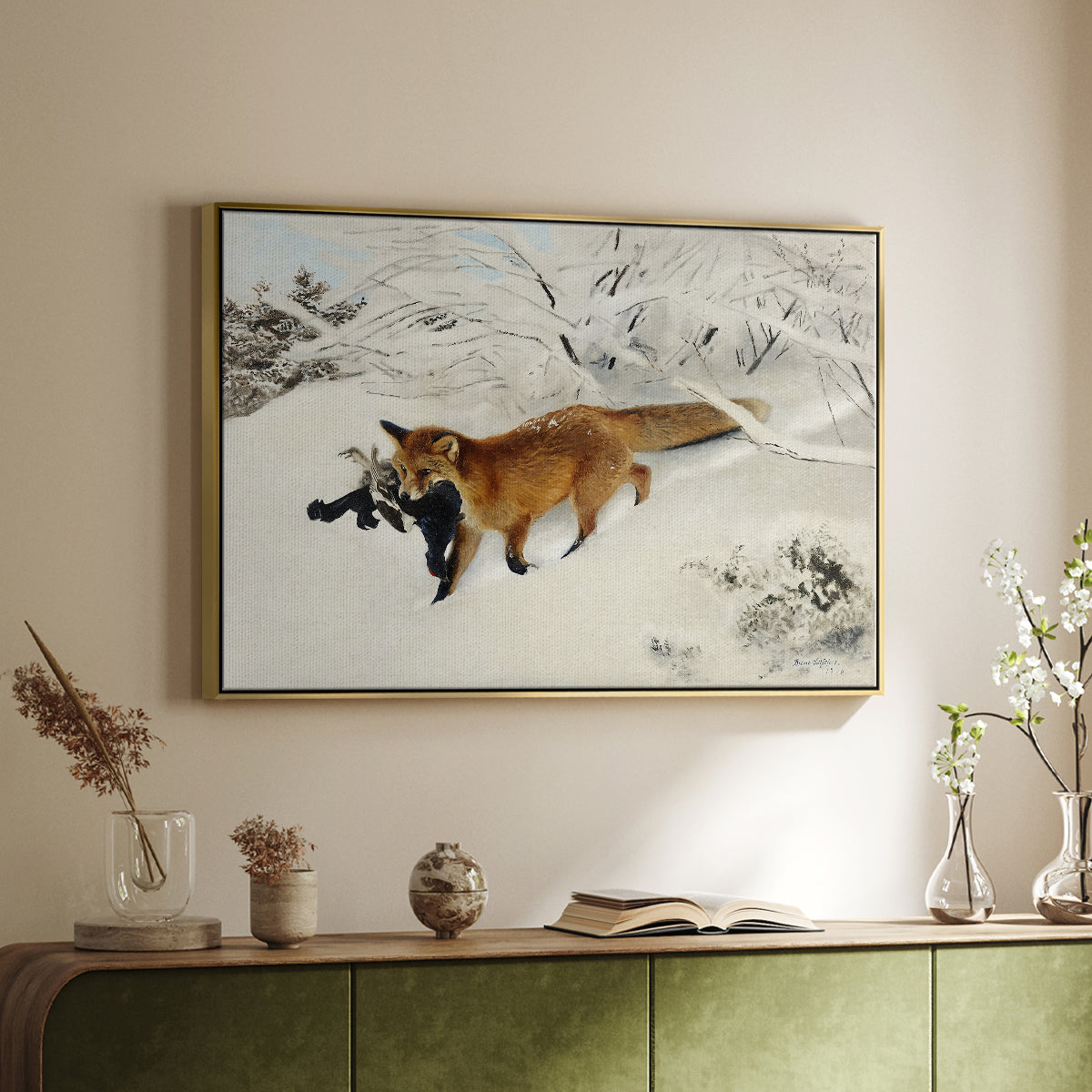 Gold floater framed canvas of Fox in Snow Landscape, 1900 by Bruno Liljefors, featuring a wildlife scene of fox moving swiftly through winter terrain above a sideboard in a softly lit hallway.