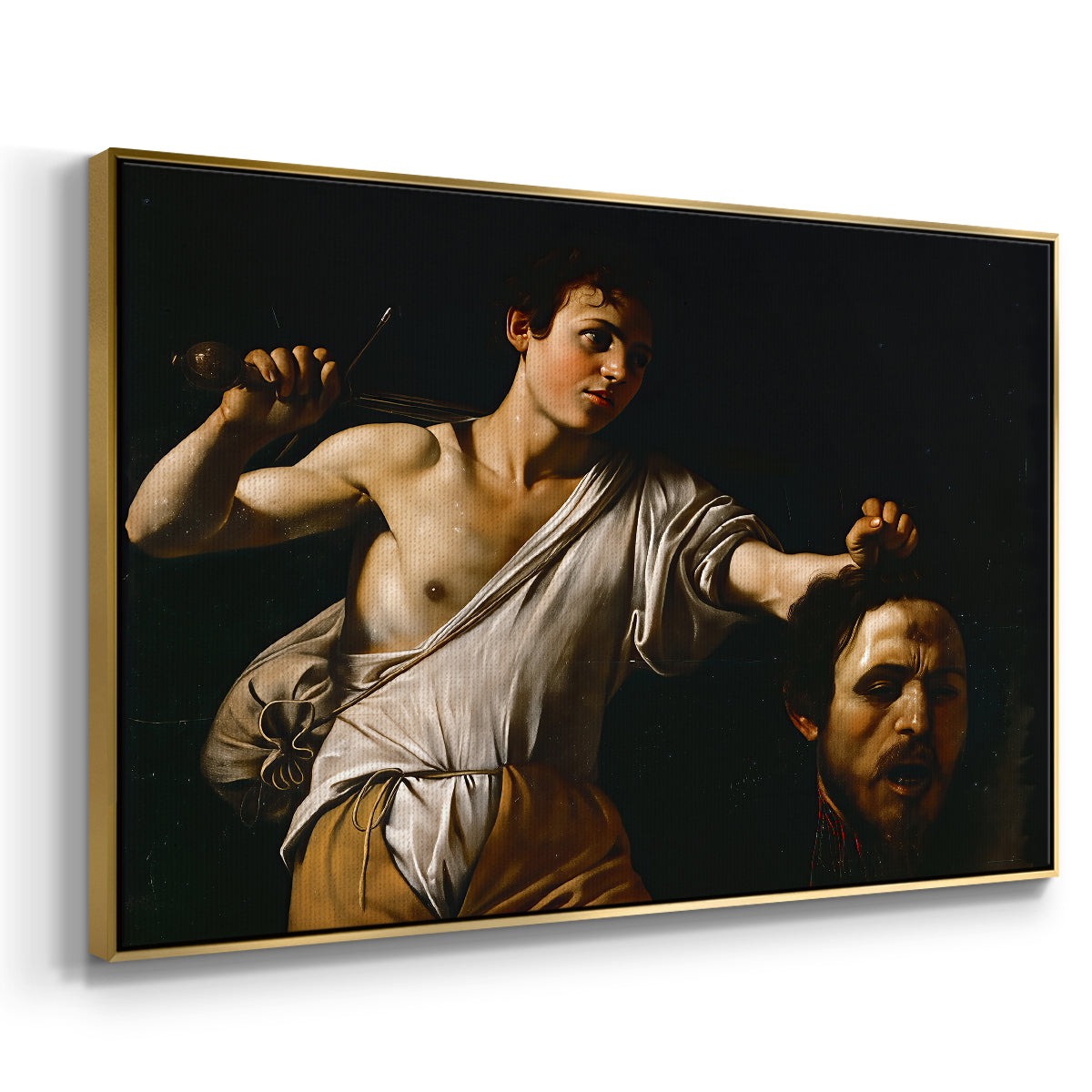 Angled view of David with the Head of Goliath (Vienna Version), c. 1607 by Caravaggio in a gold floater framed canvas.